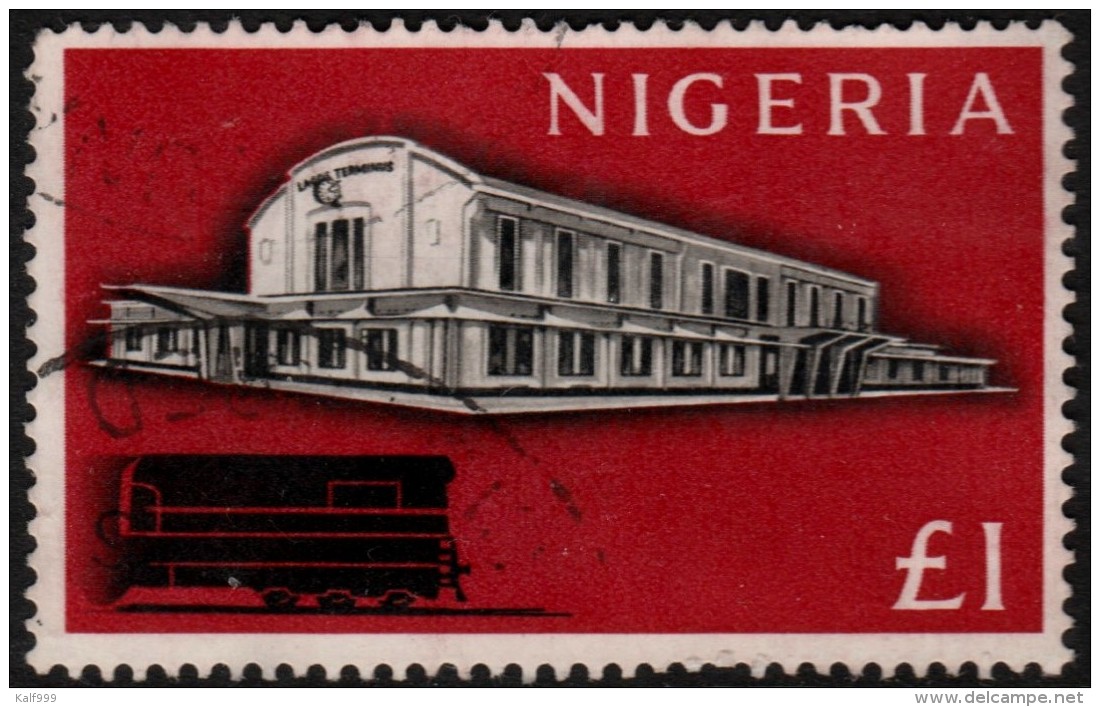 ~~~ Nigeria 1961 - Railway Station Lagos Trains 1 &pound; - Mi. 104 (o) Used - CV 12.00 &euro;  ~~~ - Nigeria (...-1960)