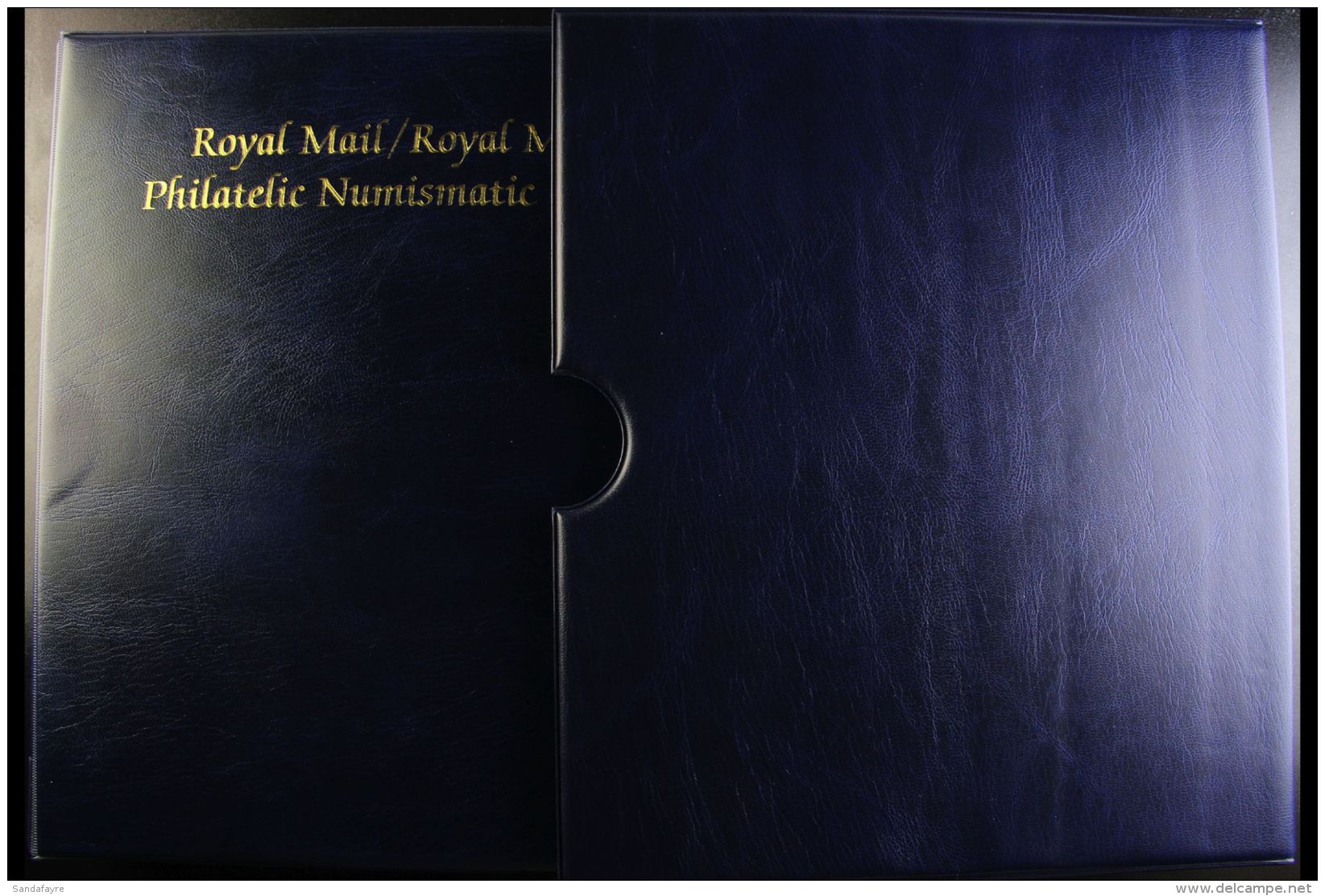 ALBUMS WITH SLIPCASES An Attractive Set Of Six Navy Blue Royal Mail/Royal Mint Philatelic Numismatic Cover Albums... - Andere & Zonder Classificatie