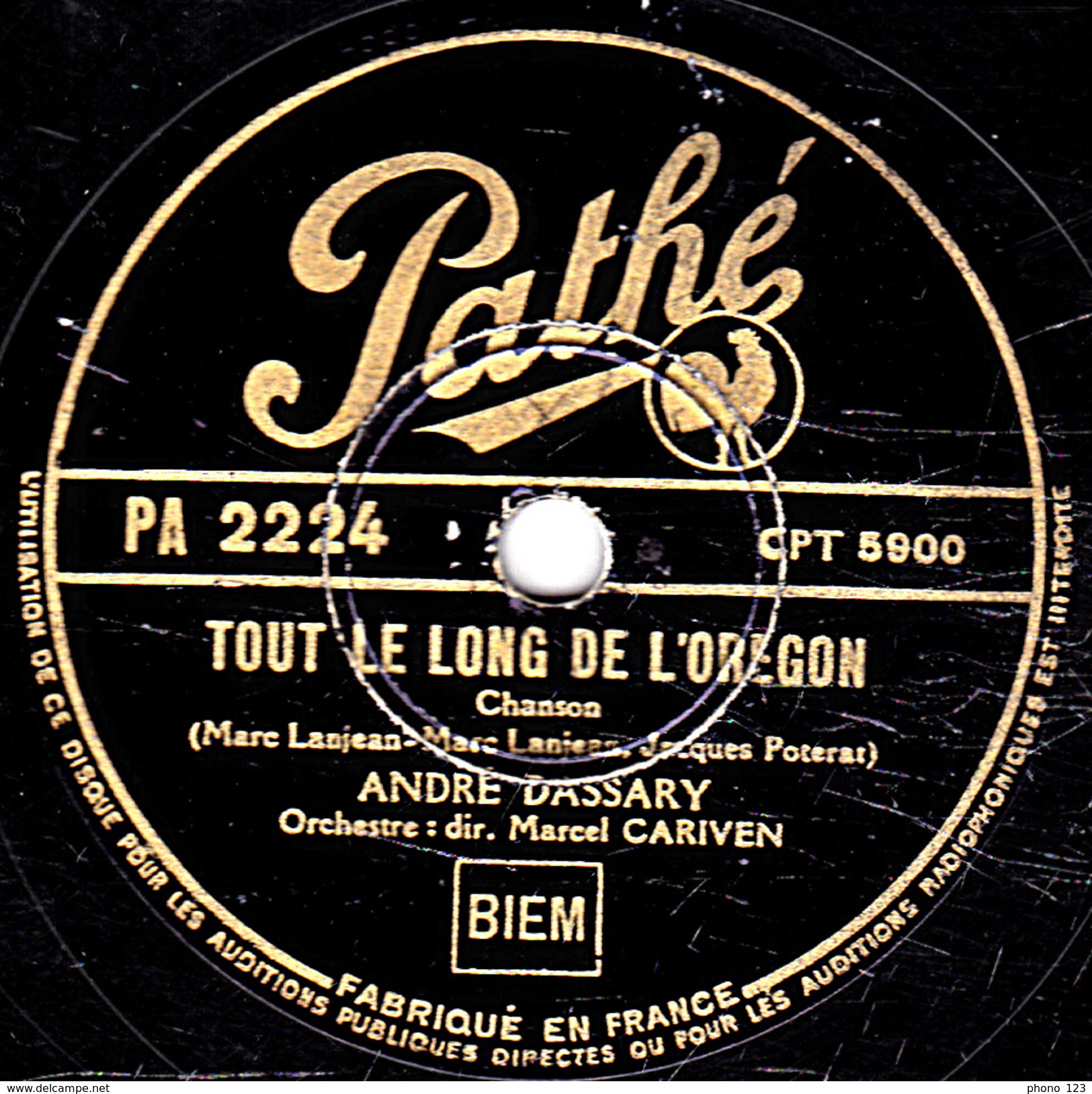 78 T. - 25 Cm - état  B -  ANDRE DASSARY - LE MONDE EST A MOI - TOUT AU LONG DE L'OREGON - 78 T - Disques Pour Gramophone