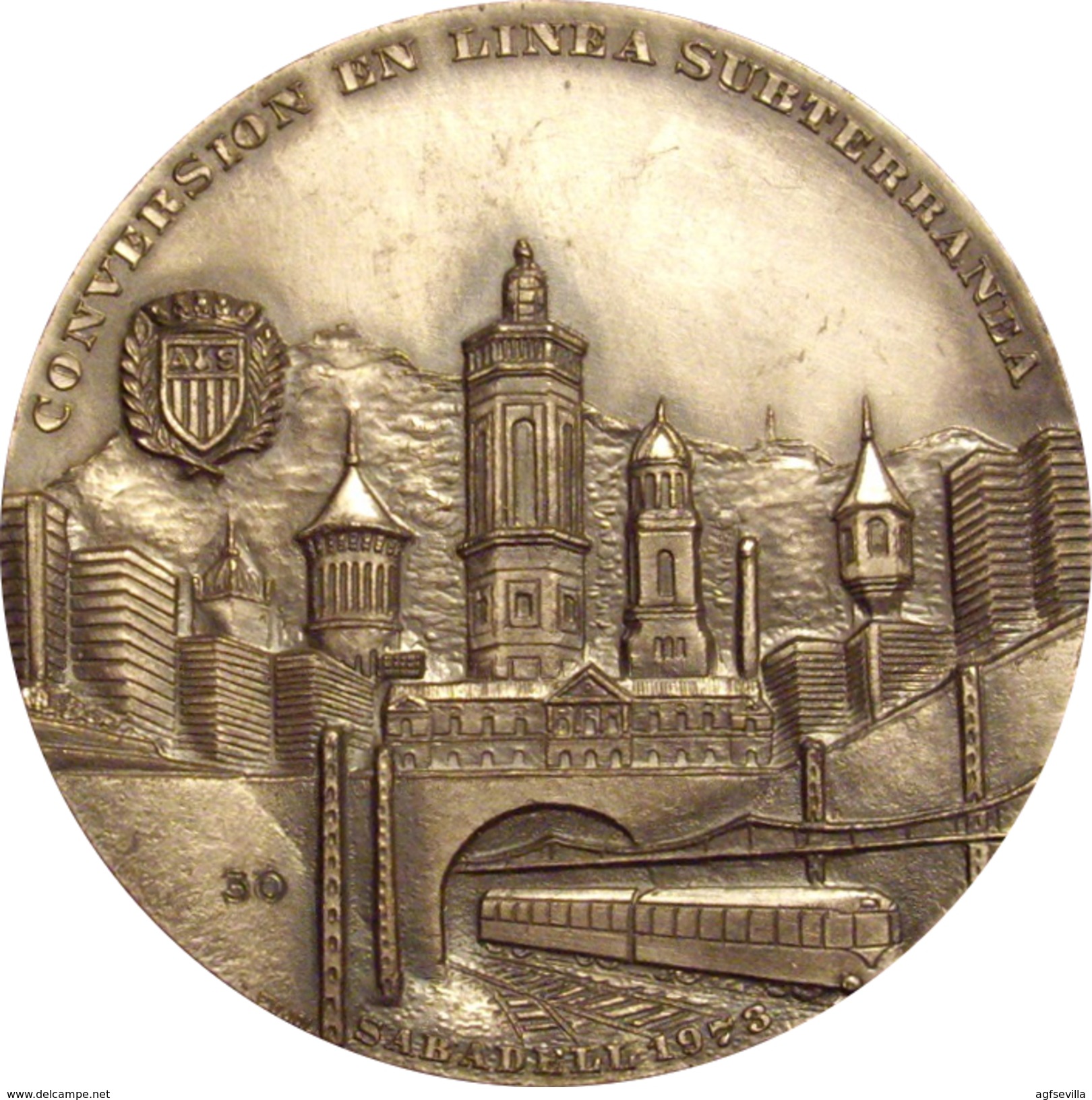 ESPAÑA. MEDALLA DE LA CONVERSION EN LÍNEA SUBTERRANEA DEL FERROCARRIL EN SABADELL. 1.973. ESPAGNE. SPAIN MEDAL - Firma's