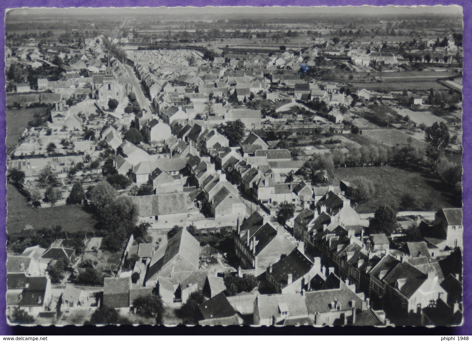 -CHATEAUMEILLANT. En Avion Au-dessus De...Rue De La Libération. Recto-verso. - Châteaumeillant