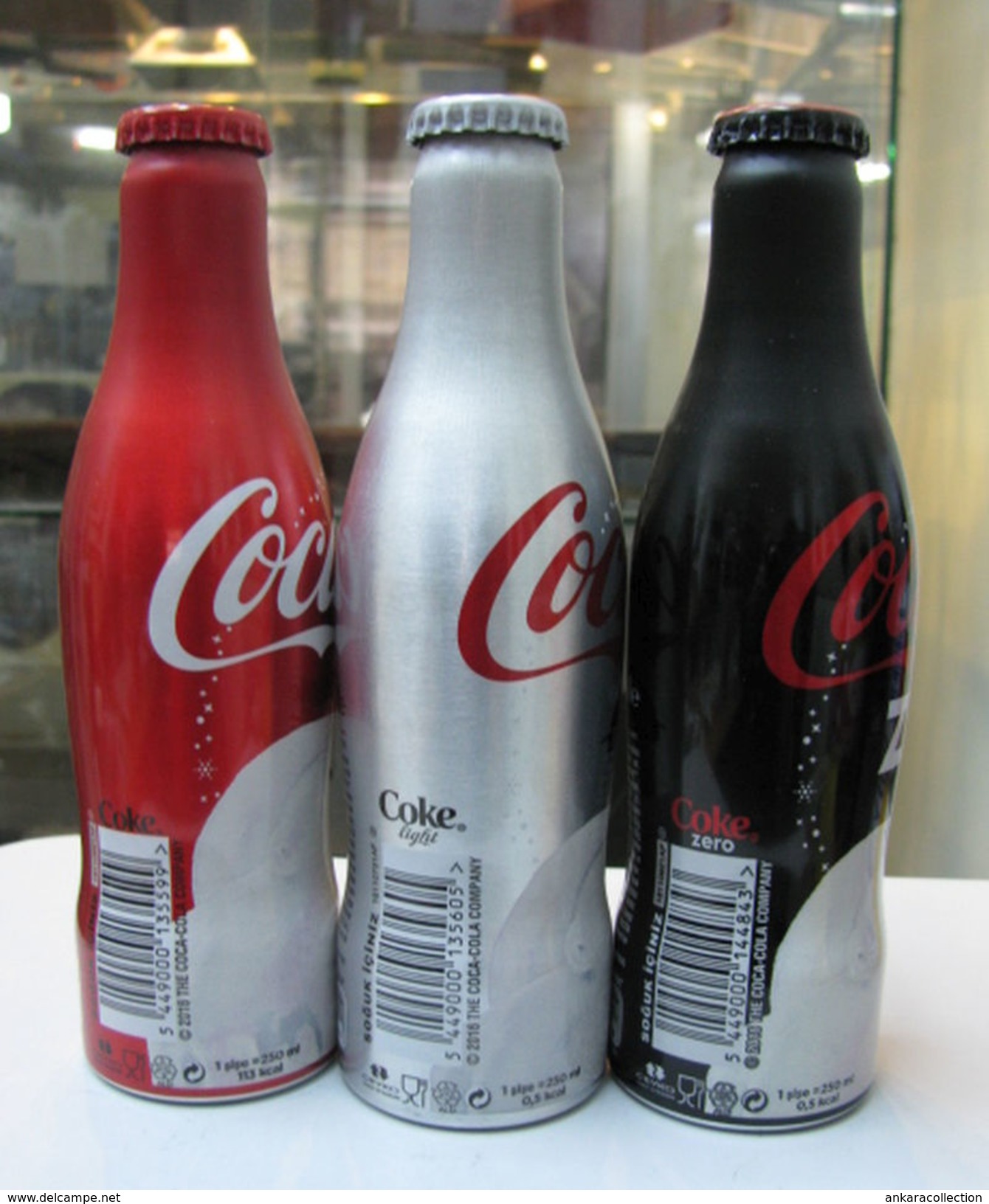 AC - COCA COLA BEAR ILLUSTRATED ALUMINUM EMPTY BOTTLES 3 PIECES SET & CROWN CAPS - Flaschen