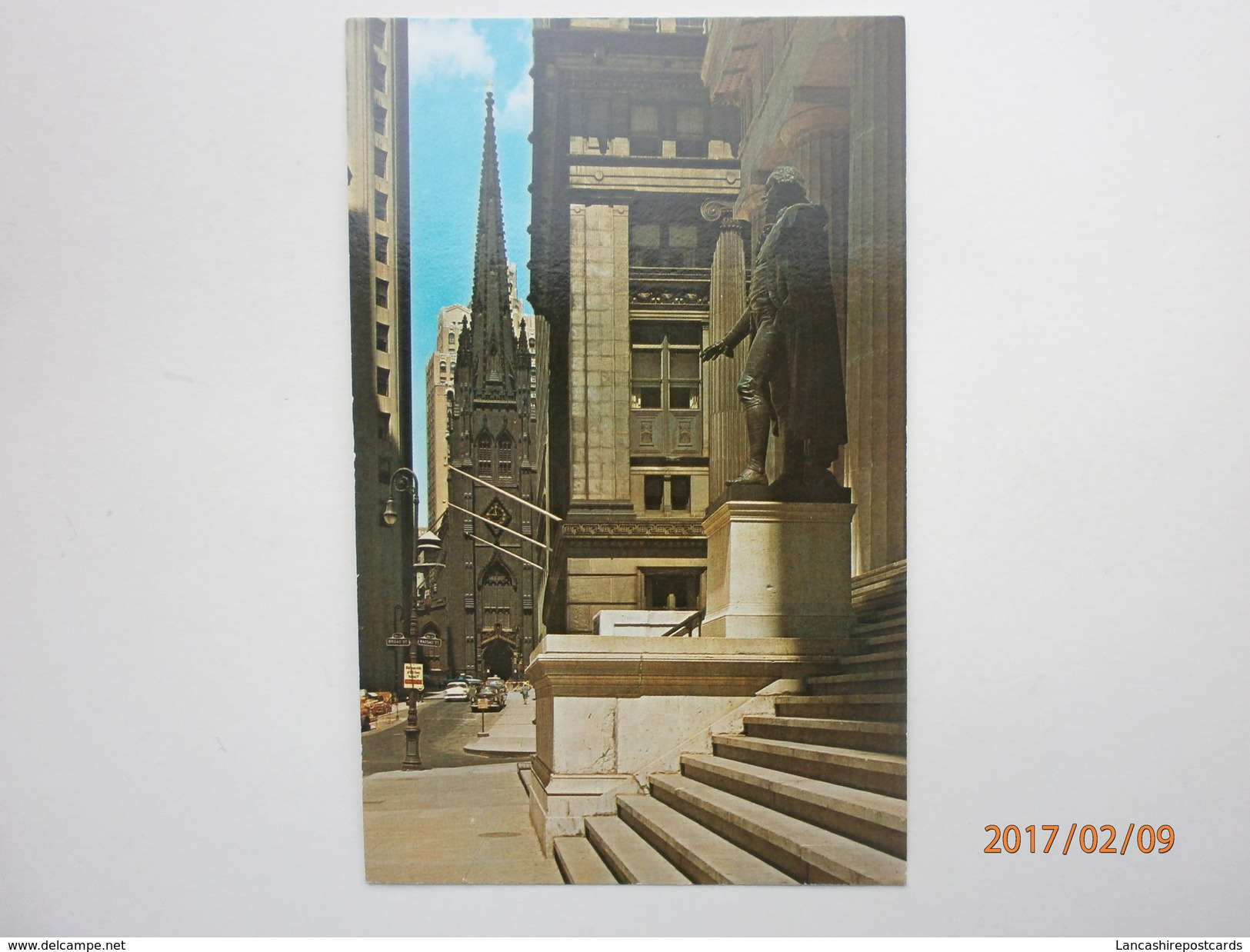 Postcard Trinity Church Looking Down Wall Street New York City My Ref B1747 - Wall Street