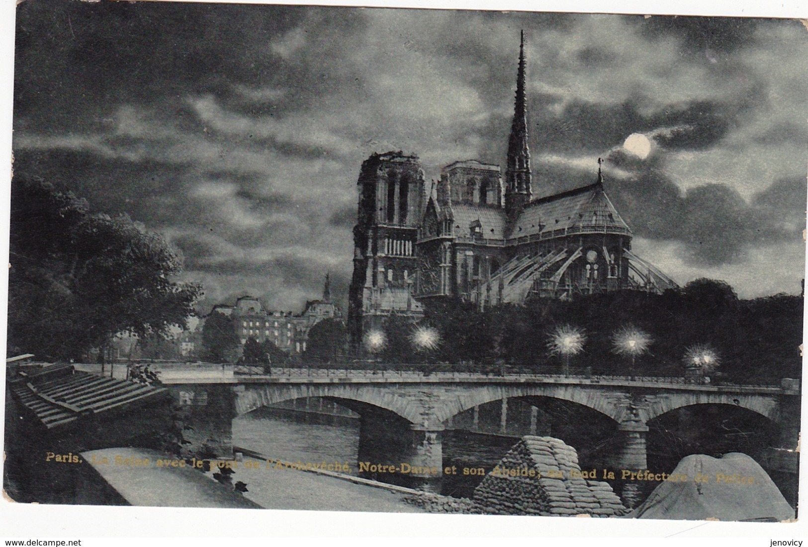 REF283 PARIS LA SEINE LE PONT DE L ARCHEVECHE NOTRE DAME ET SON ABSIDE LA PREFECTURE DE POLICE VUE DE NUIT VOIR DETAIL - París La Noche