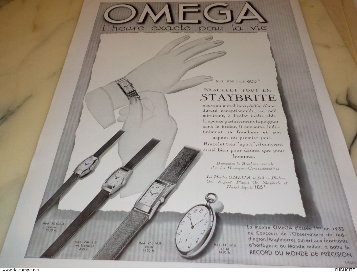 ANCIENNE PUBLICITE BRACELET  EN STAYBRITE  MONTRE OMEGA 1934 - Autres & Non Classés