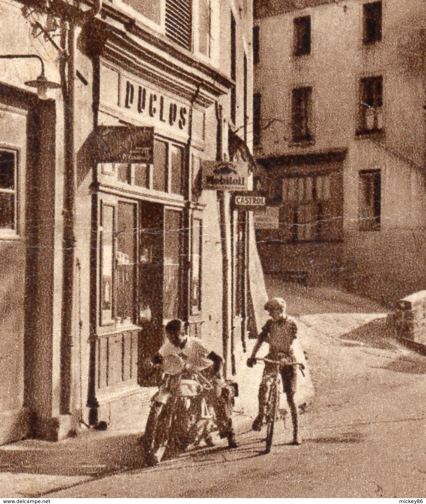 CUNLHAT--Rue De La Poste (animée,moto,vélo,pub Castrol) Cpsm 14 X 9 éd  Combier - Cunlhat