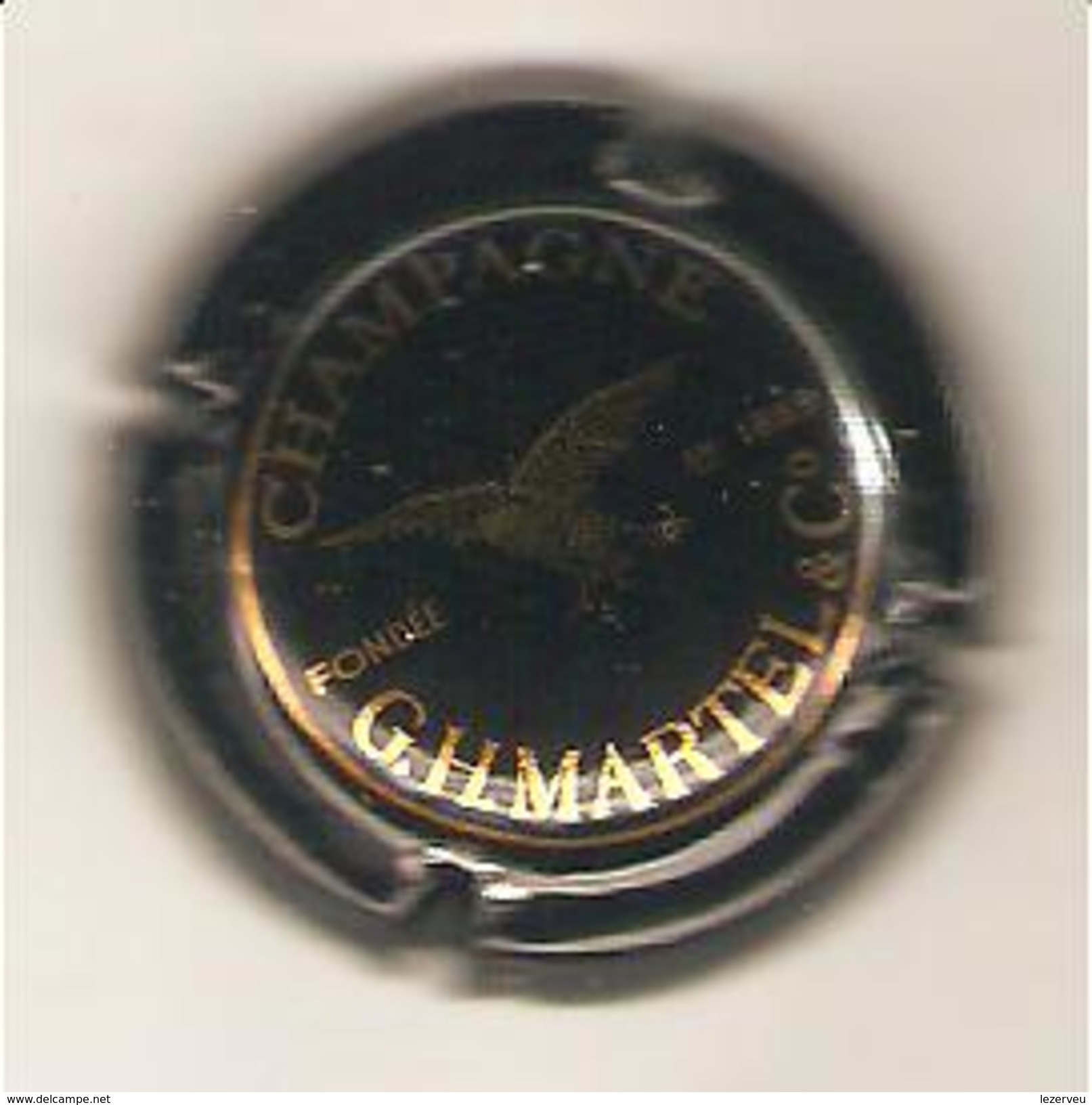 CAPSULE DE MUSELET CHAMPAGNE G.H. MARTEL (or Sur Fond Noir,fondee En 1869) - Martel GH