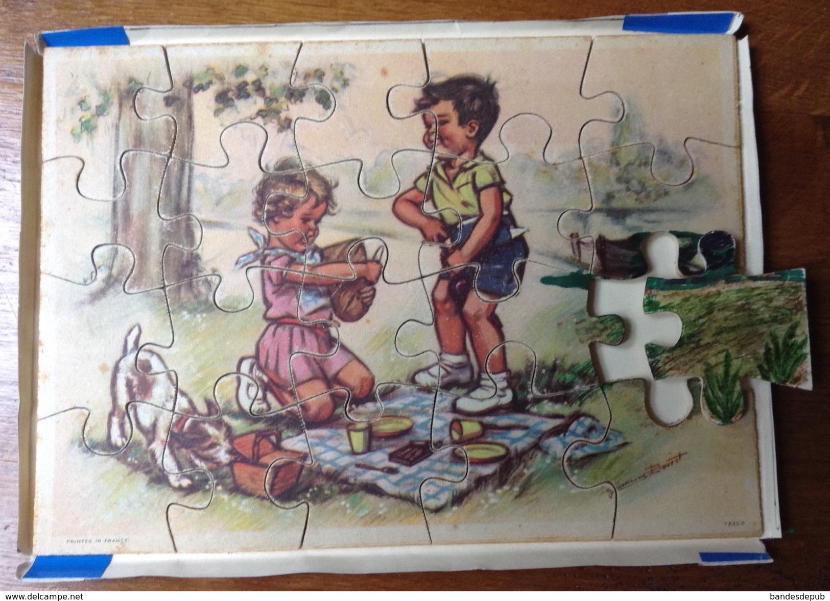 Rare Puzzle En Bois Illustrateur Germaine Bouret Enfants Pique Nique Tire Bouchon Vin 16 Pièces à 24,5 Cm Par 17,8 Cm - Bouret, Germaine