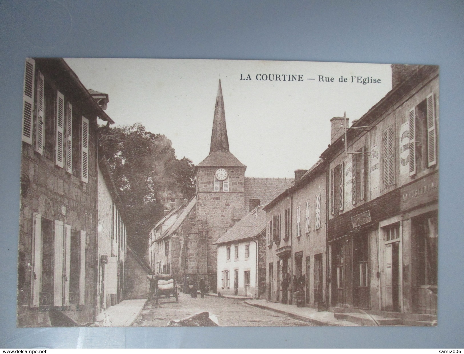 CPA 23 LA COURTINE RUE DE L'EGLISE - La Courtine