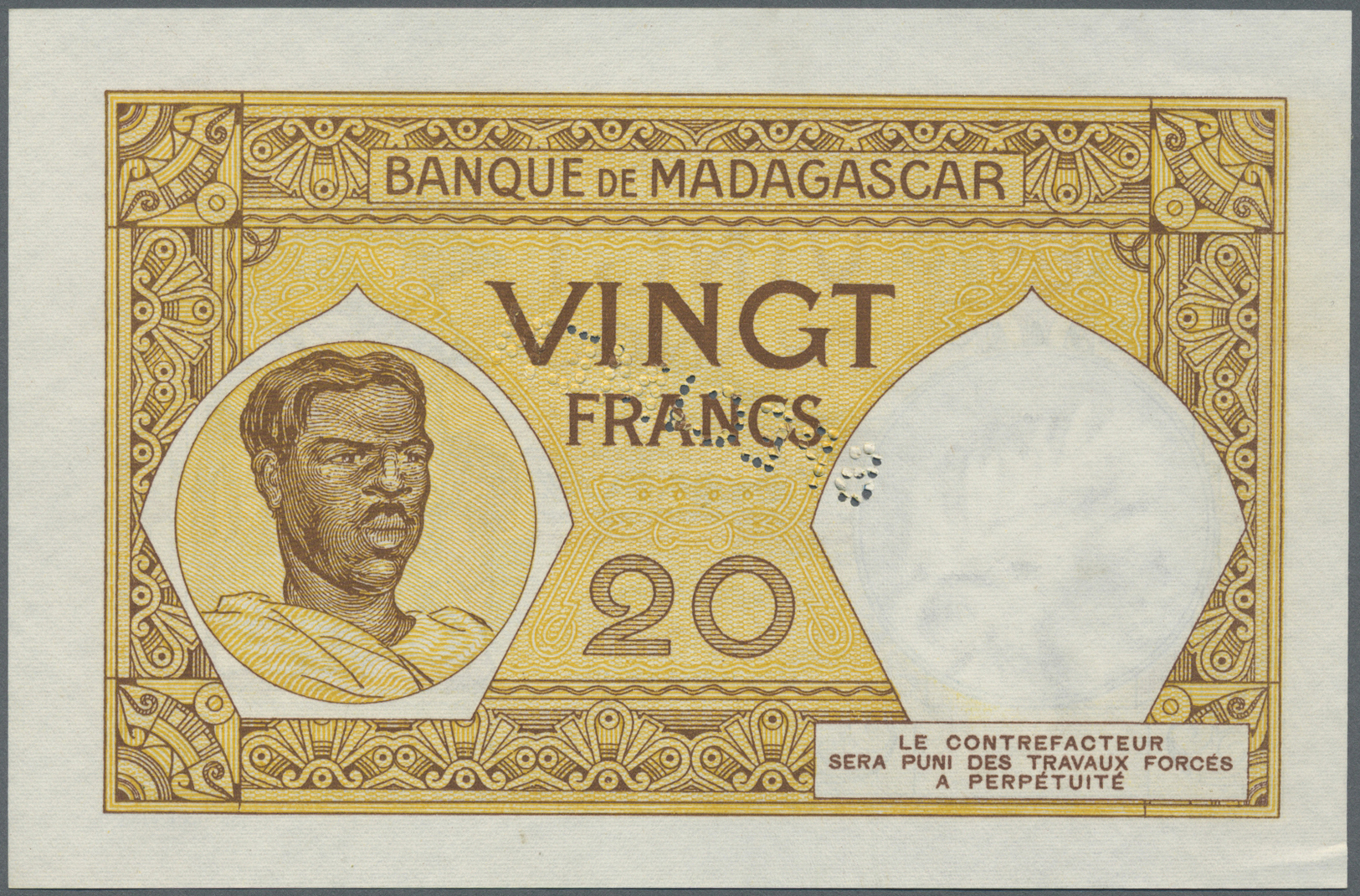 01620 Madagascar: 20 Francs ND(1938) Specimen P. 37s, Specimen Perforation At Center, W/o Serial Numbers, Light Handling - Madagascar