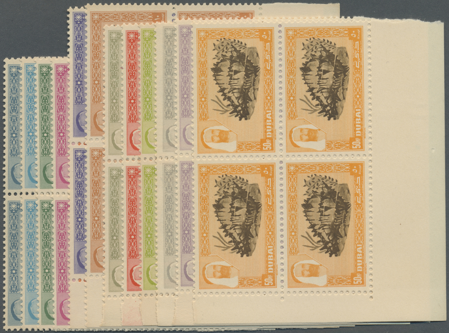 ** Dubai: 1963, Definitives Complete Perforated Set Of 17 Values In Blocks Of Four Incl. Many From Margins Or Corners, M - Dubai