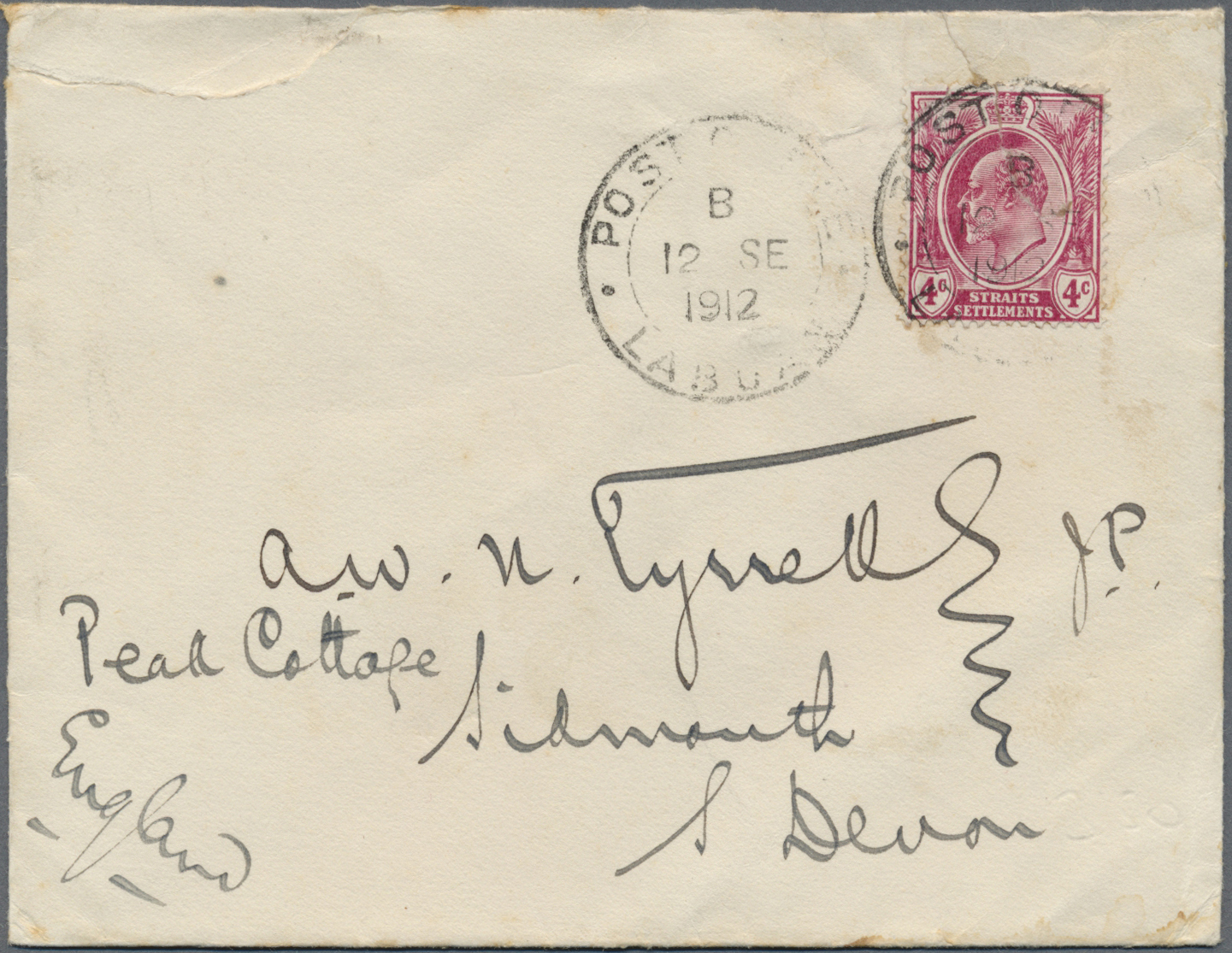 Br Labuan: 1912. Envelope (faults/tears) Addressed To England Bearing Straits Settlements SG 155, 4c Dull Purple Tied By - Other & Unclassified