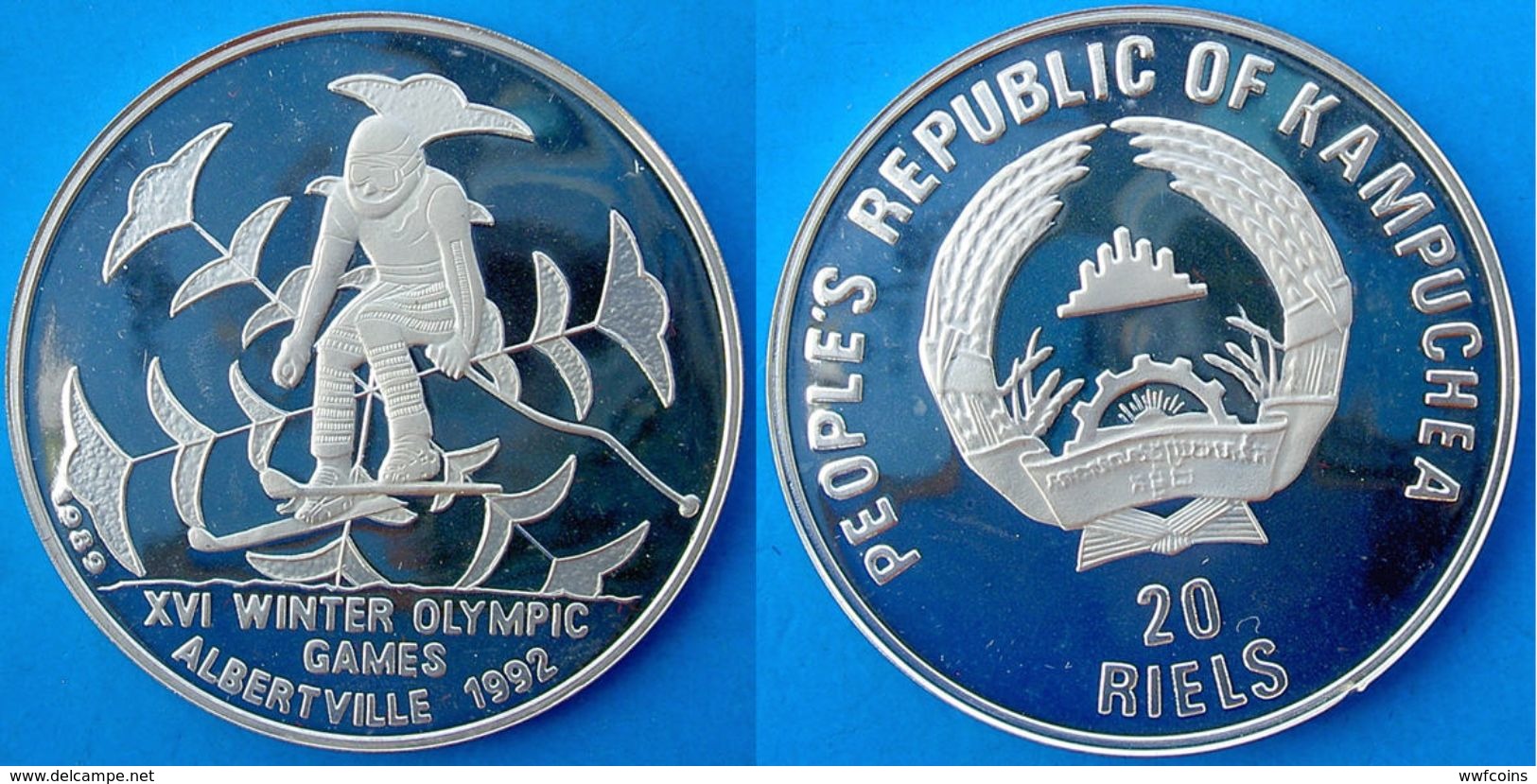 CAMBODIA 20 R 1989 ARGENTO 9999 SILVER PROOF WINTER OLYMPIC GAMES SKYER RARA MINTAGE PESO 16g TITOLO 0,9999 CONSERVAZION - Kambodscha