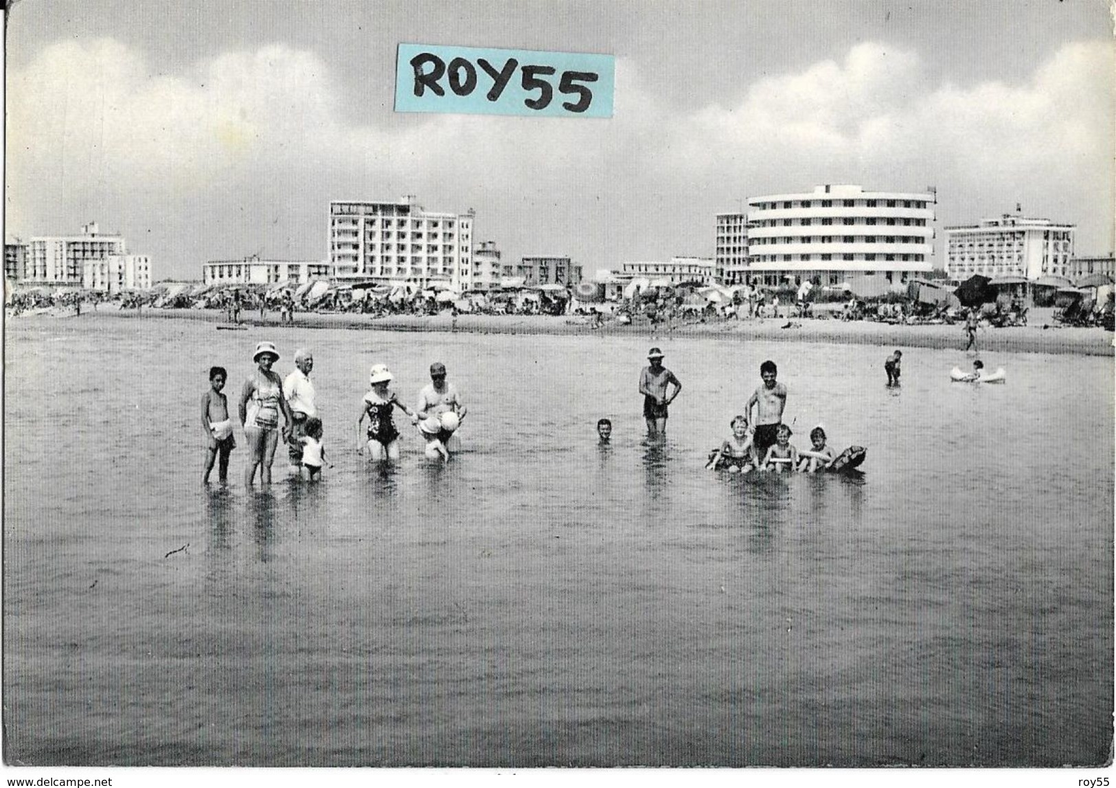 Veneto-venezia-bibione Lido Di Bibione Veduta Da Mare Bagnanti In Mare Riva Con Spiaggia Affollata Palazzi Anni 50/60 - Altri & Non Classificati