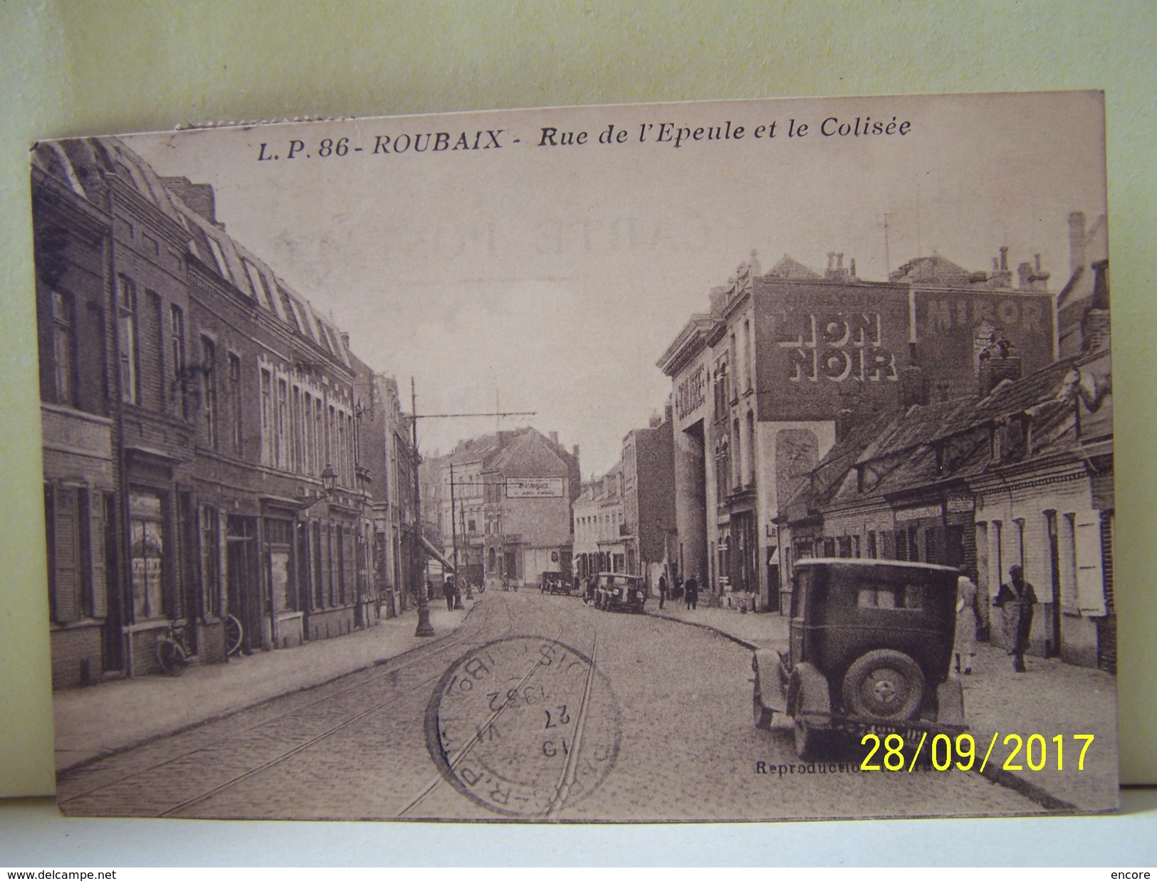 ROUBAIX (NORD) LES COMMERCES. LES MAGASINS. LES VOITURES. RUE DE L'EPEULE ET LE COLISEE.    101_0219"b" - Roubaix