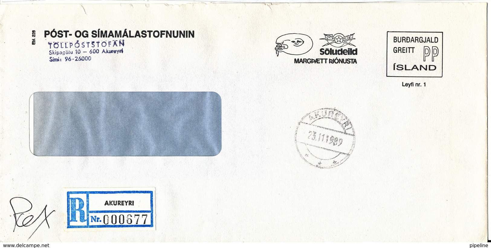 Iceland Registered Cover Sent Port Paid To Denmark Akureyri 23-11-1989 (the Cover Is A Bit Damaged By Opening) - Covers & Documents