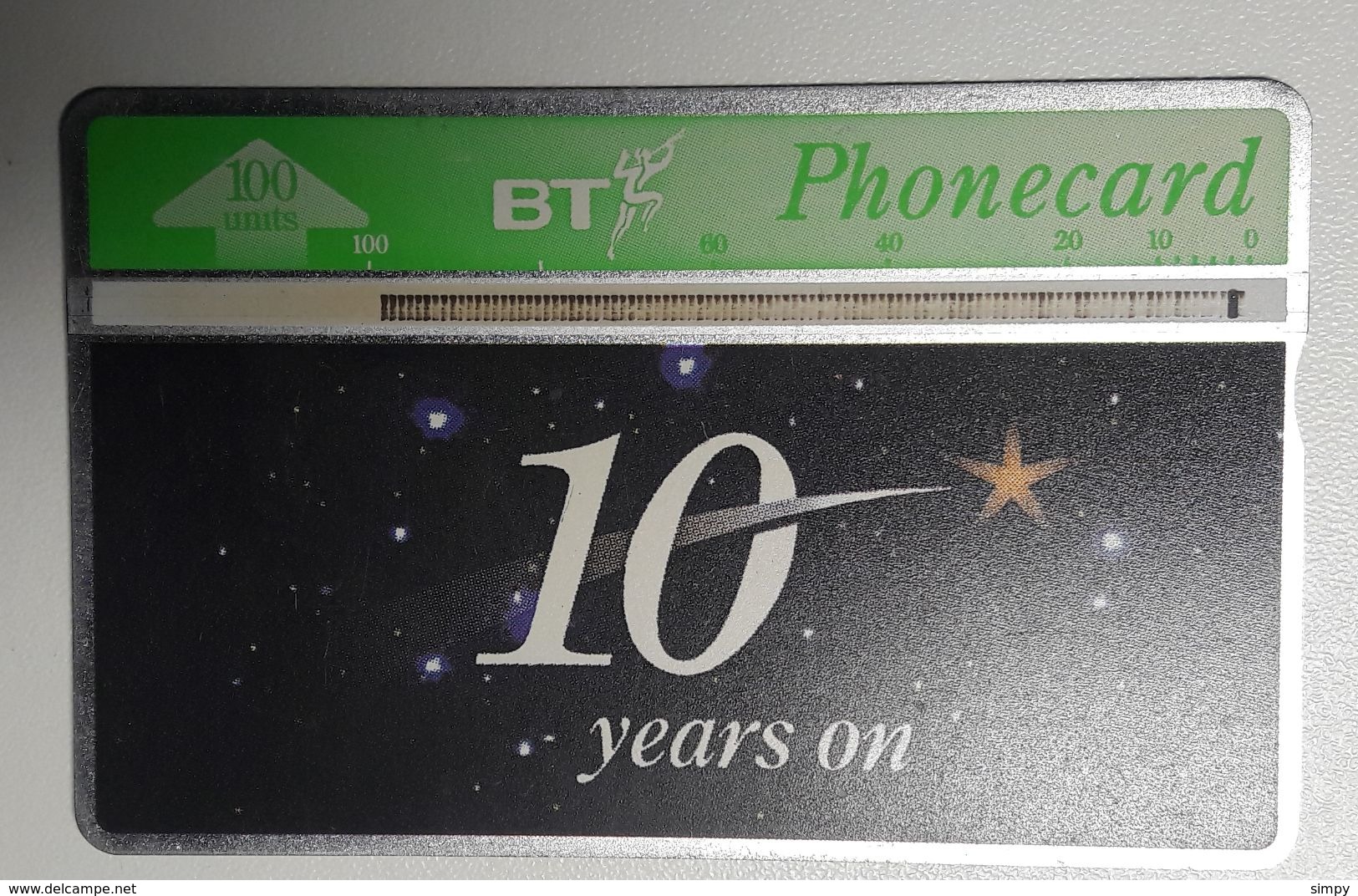 United Kingdom BT 10 Years On Space Magnet Phone Card 100 Units - BT Kaarten Voor Hele Wereld (Vooraf Betaald)