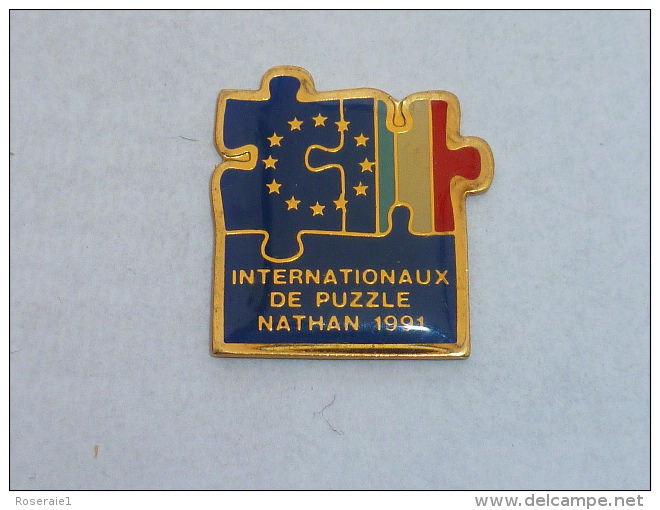 Pin's INTERNATIONAUX DE PUZZLE NATHAN 91 - Autres & Non Classés