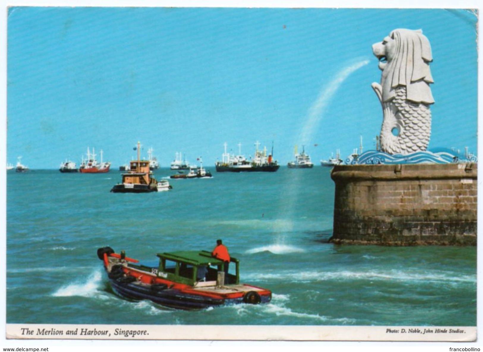 SINGAPORE - THE MERLION AND HARBOUR (PUB. JOHN HINDE) / WITH INDONESIA STAMP - Singapore