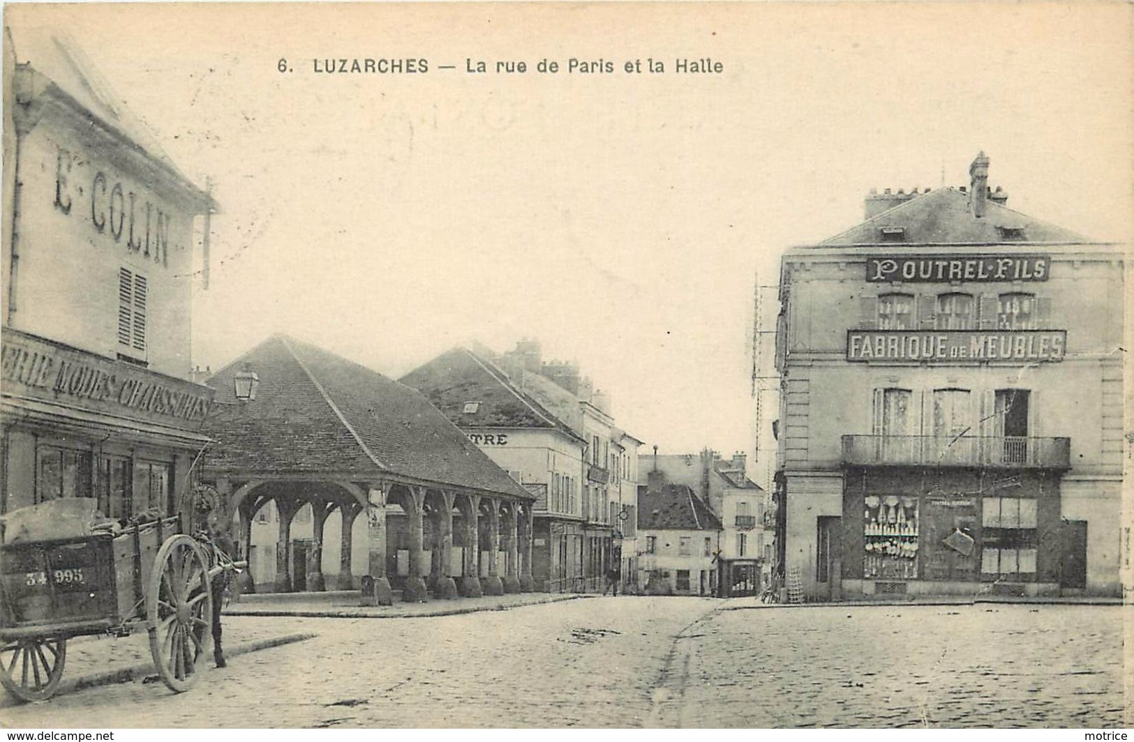 LUZARCHES - La Rue De Paris Et La Halle. - Luzarches