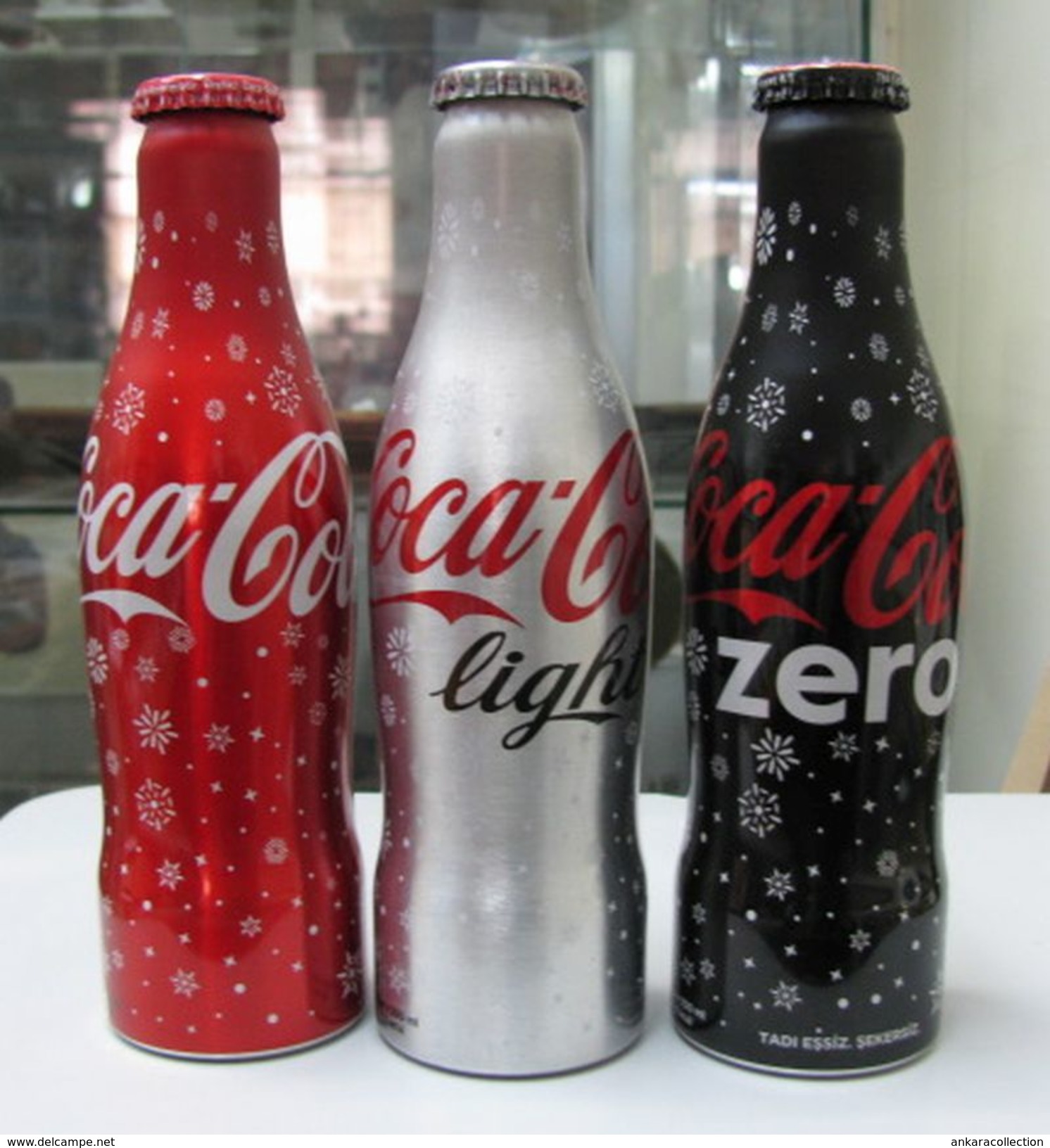 AC - COCA COLA SNOWING ILLUSTRATED 2017 - 2018 NEW YEAR ALUMINUM EMPTY BOTTLES & CROWN CAPS FROM TURKEY - Flessen