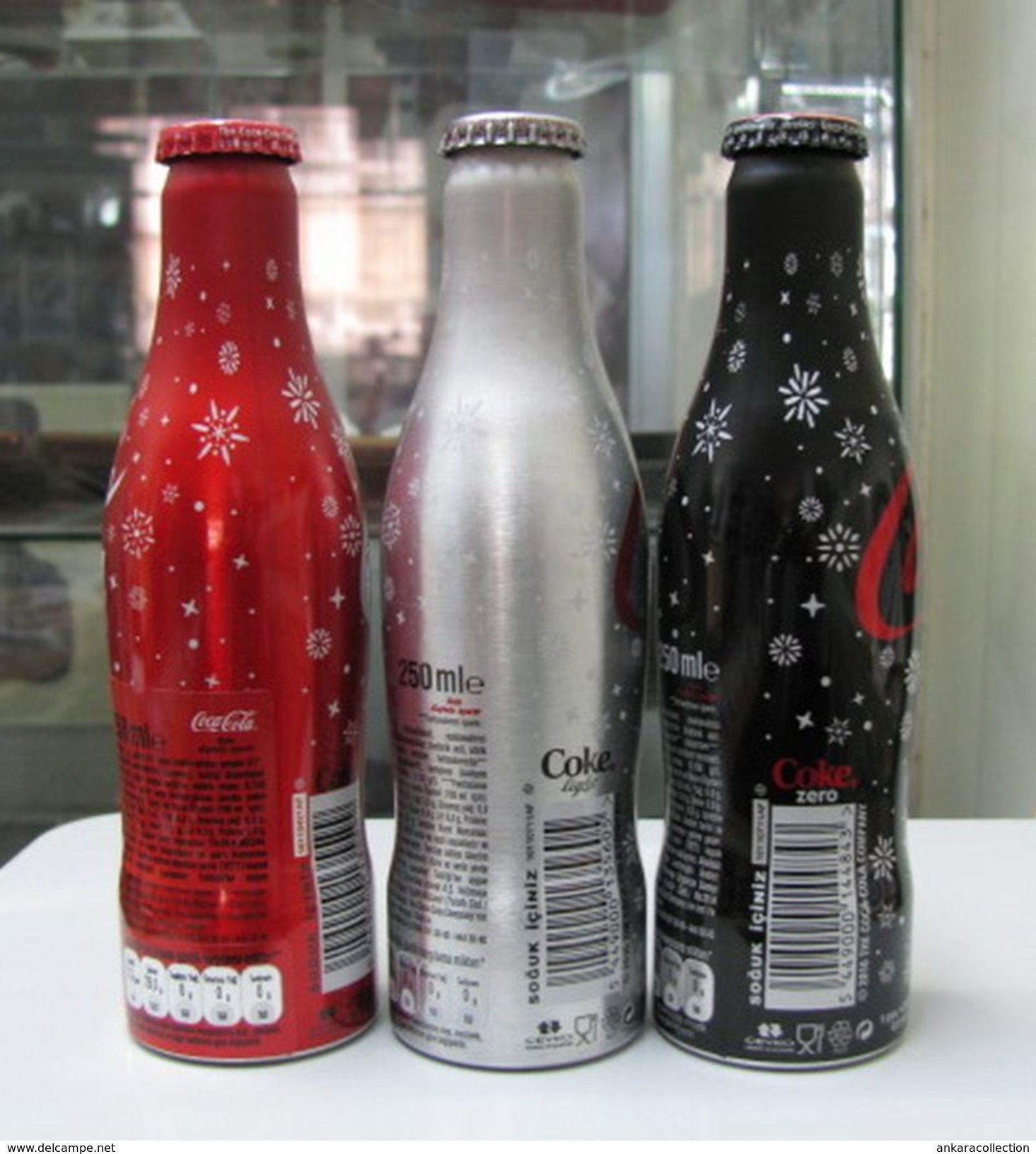 AC - COCA COLA SNOWING ILLUSTRATED 2017 - 2018 NEW YEAR ALUMINUM EMPTY BOTTLES & CROWN CAPS FROM TURKEY - Bottiglie