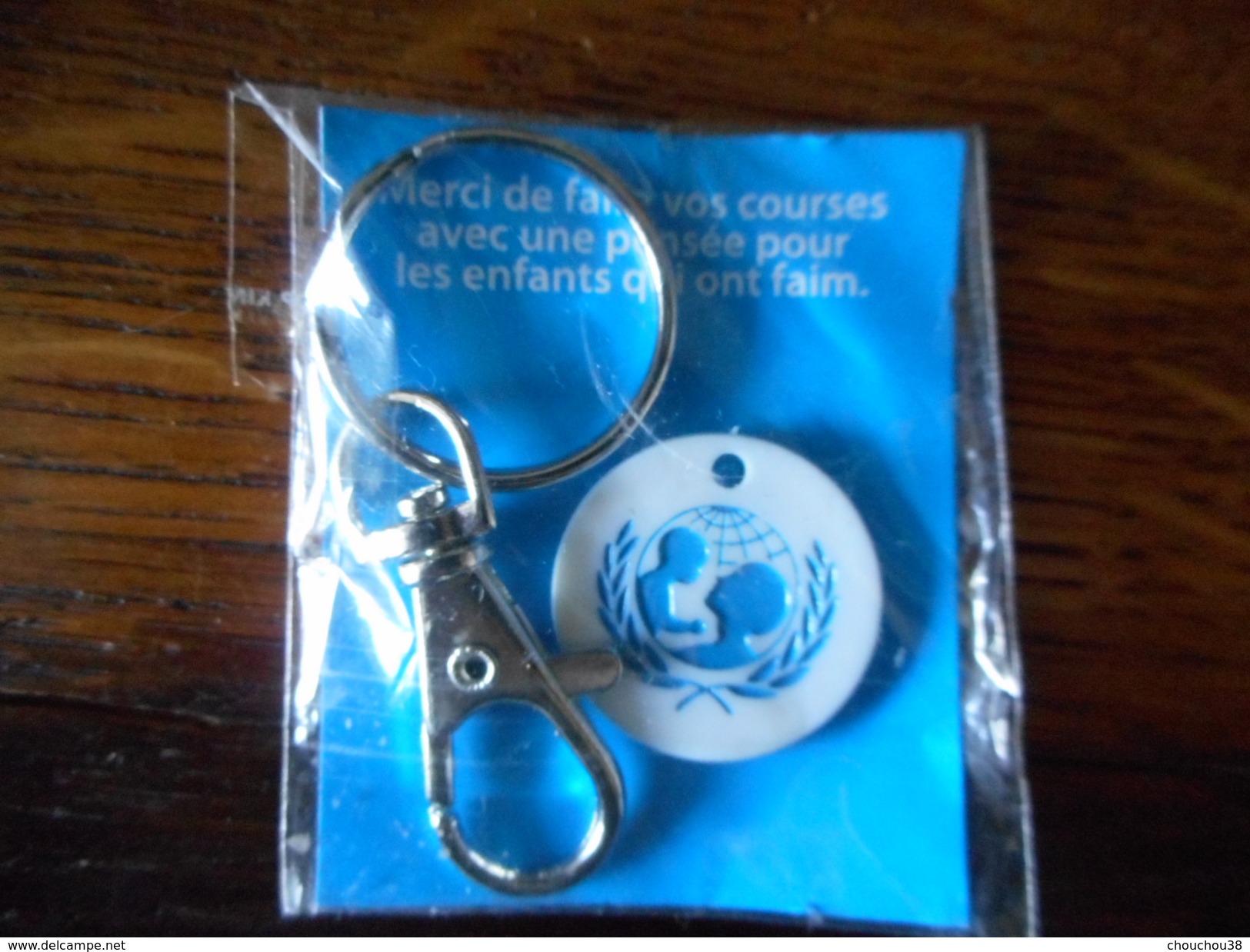 PORTE-CLEF "UNICEF" Neuf Sous Plastique - Porte-clefs