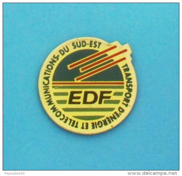 1 PIN'S  //   ** EDF ** TRANSPORT D'ENERGIE ET TELECOMMUNICATION ** DU SUD-EST ** - EDF GDF