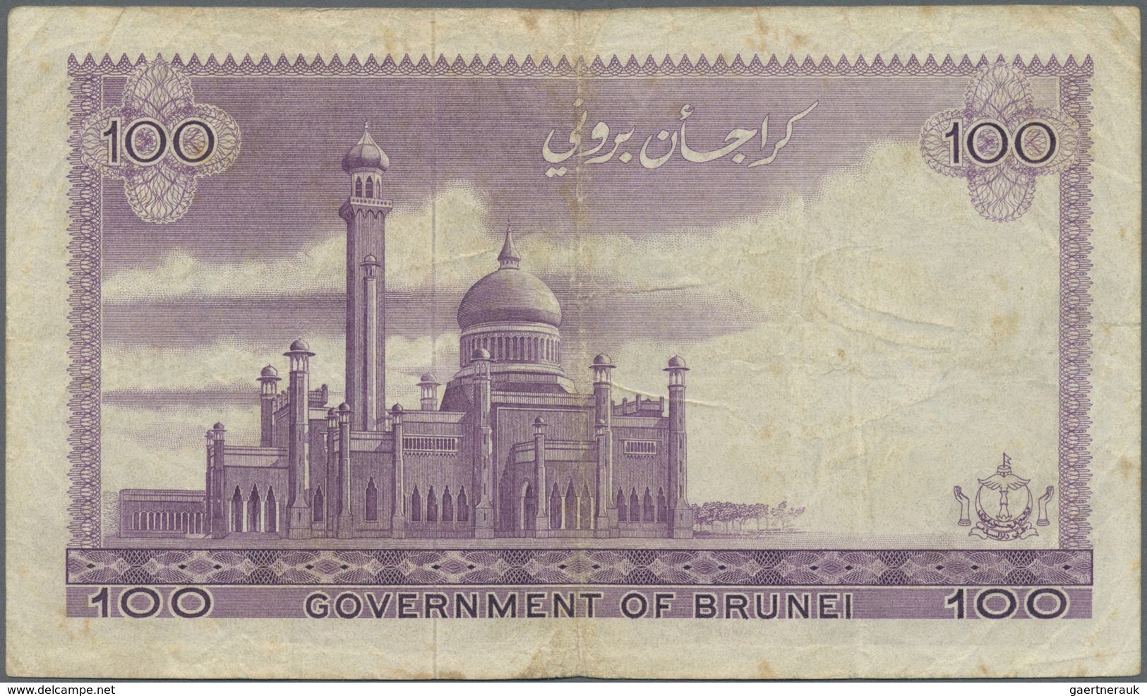 Brunei: 100 Ringgit 1967 P. 5, Used With Several Folds And Creases, Stained Paper, No Holes Or Tears - Brunei