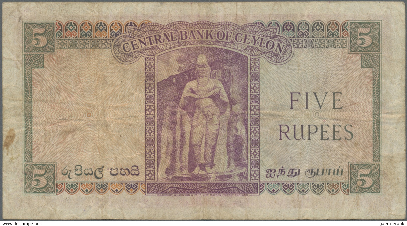 Ceylon: 5 Rupees 1952 With Prefix G/1, P.52, Lightly Stained Paper With Several Folds. Condition: F - Sri Lanka