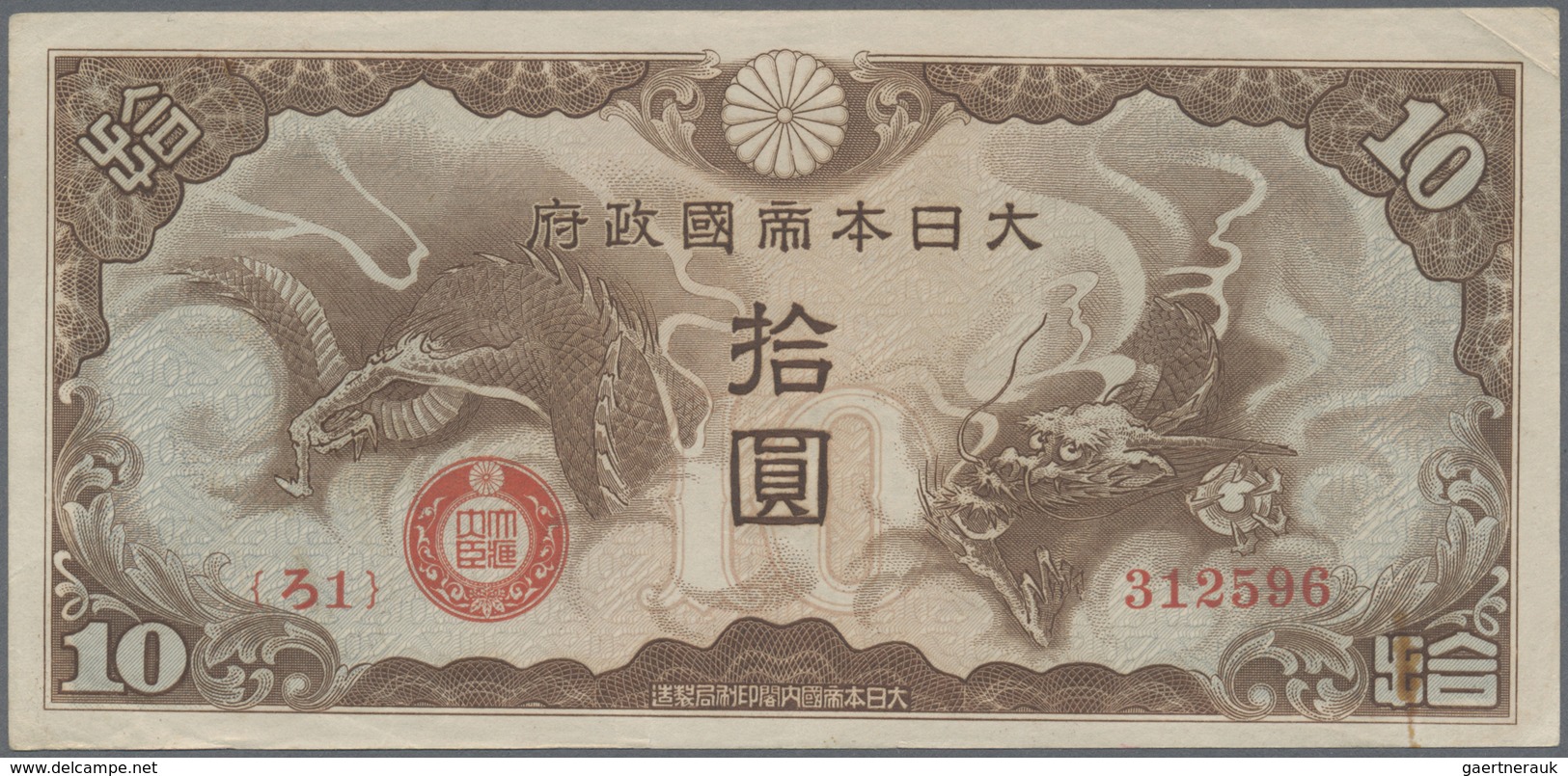 Japan: 10 Yen ND(1940) P. M4, With Serial Number, Light Folds And Stain Residuals On Back, Crispness - Japan
