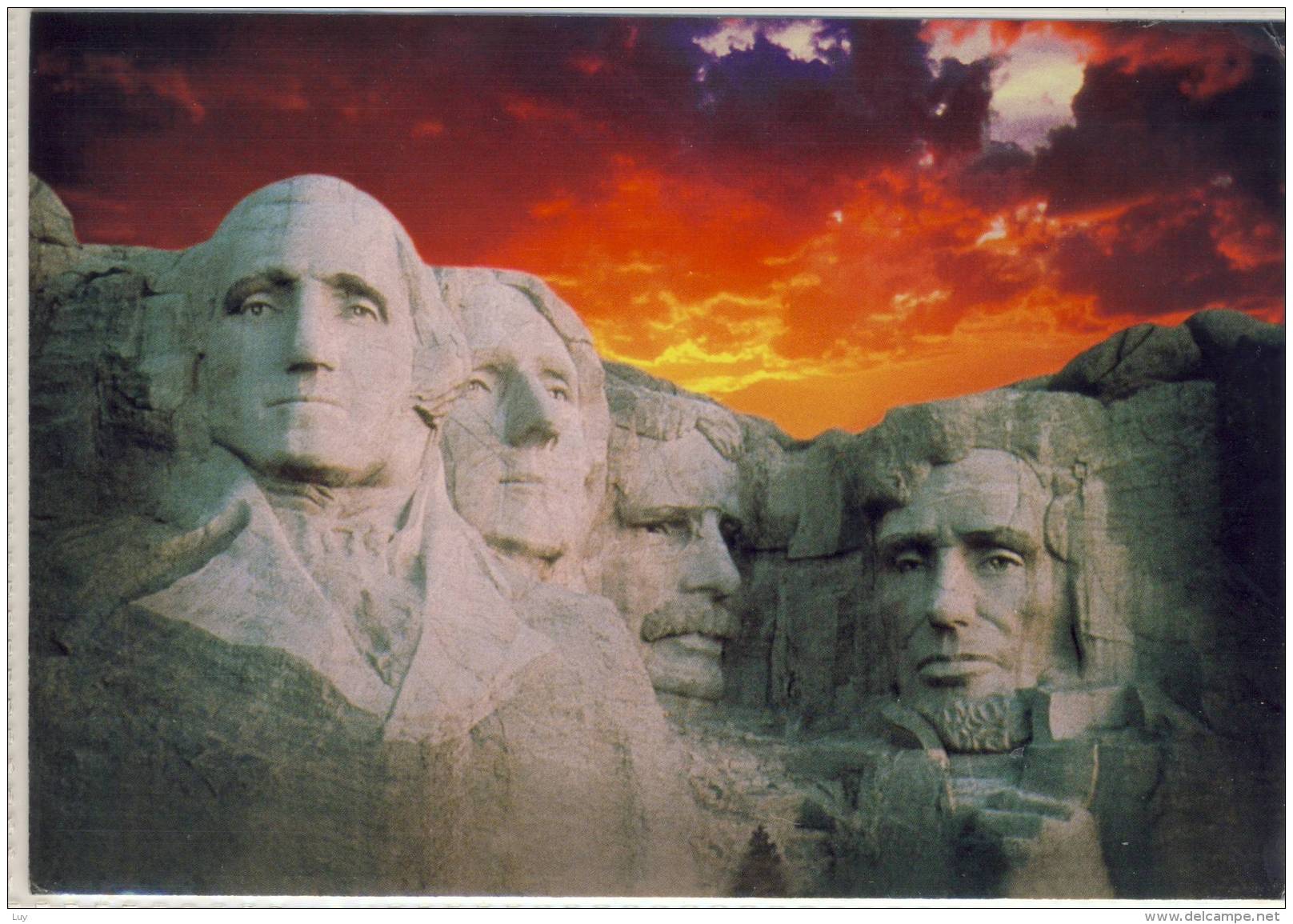 MOUNT RUSHMORE SILHOUETTED AGAINST SUNSET  USED - Mount Rushmore