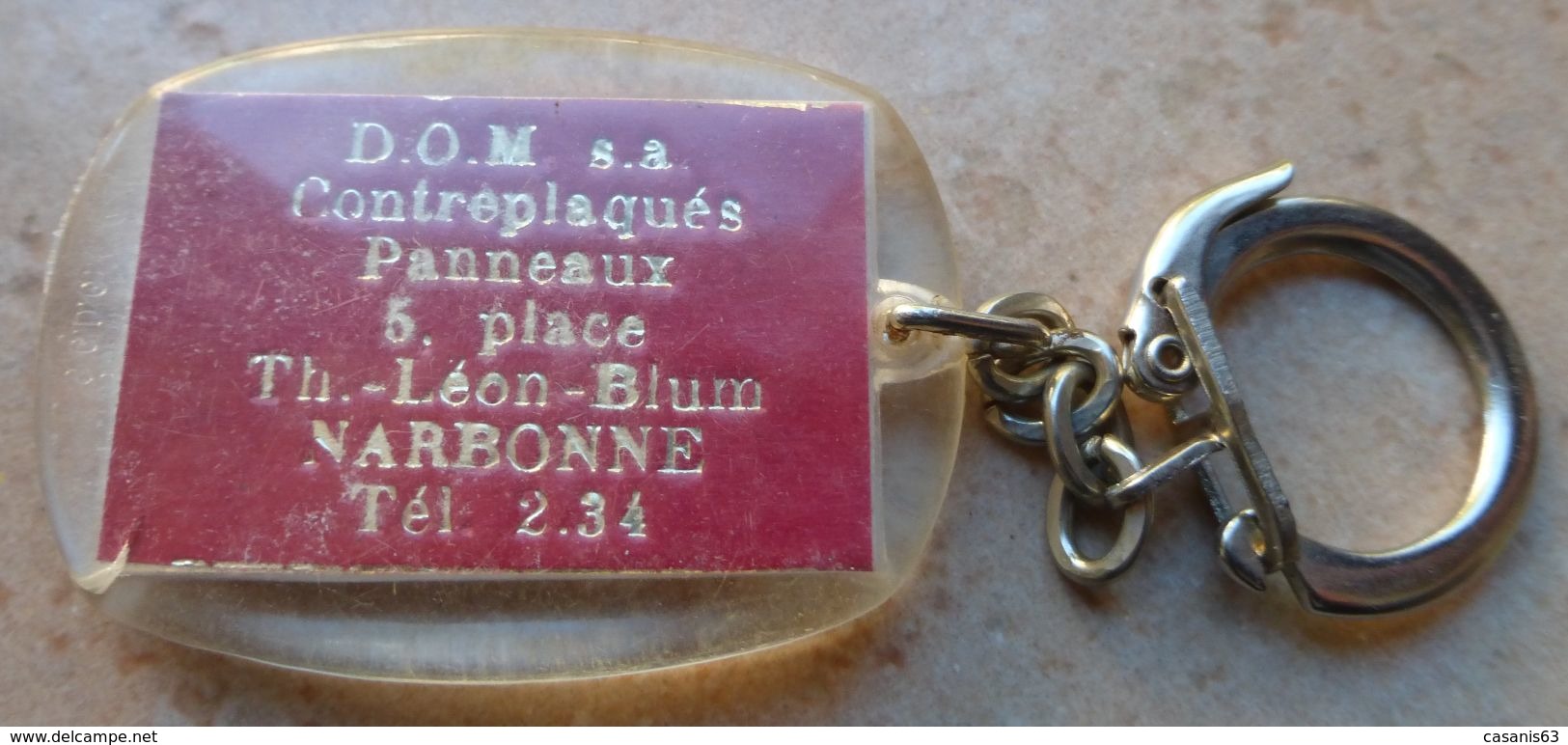 Porte  Clefs:    DOM Contreplaqué Panneaux 5 Place Th. Léon Blum Narbonne -  Renault  4 - Key-rings