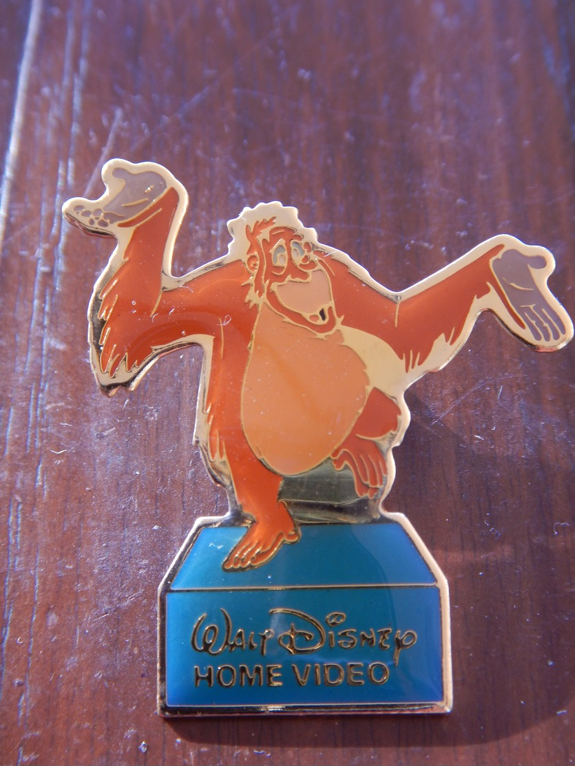 Pin's WALT DISNEY HOMME VIDEO Le Livre De La Jungle - Disney