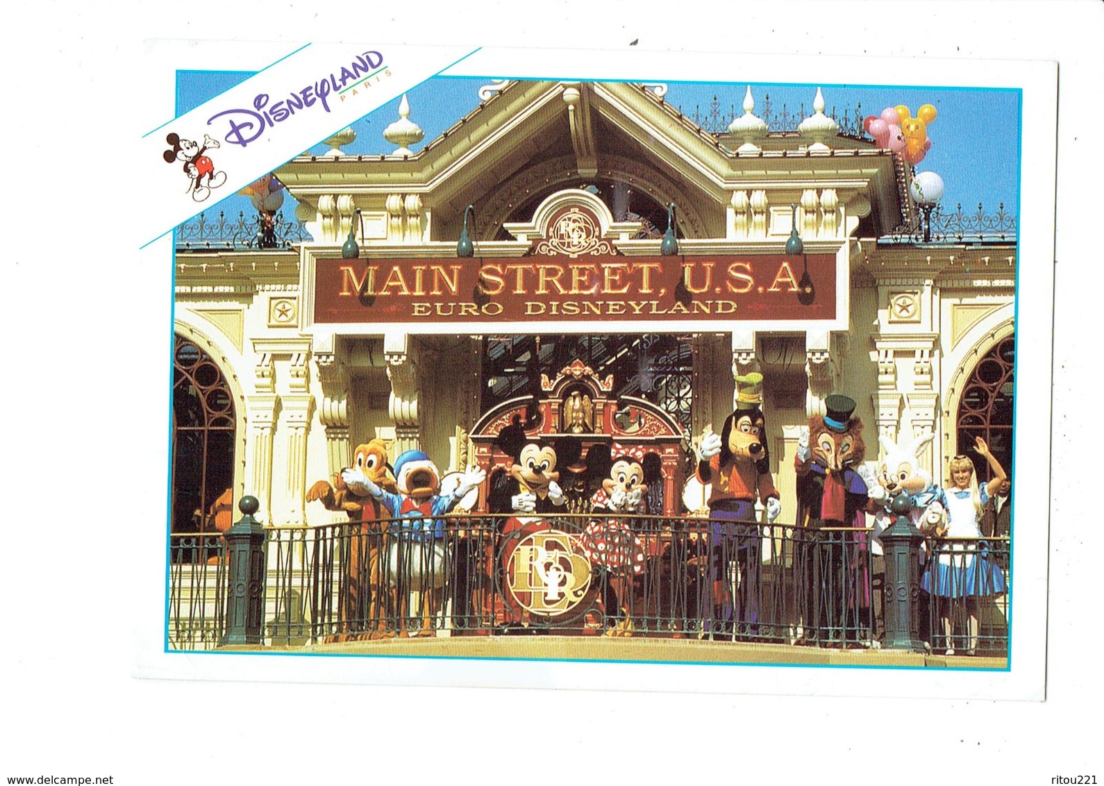 Cpm - Disney > Disneyland Paris - Main Street Station U.S.A. Euro - MICKEY DONALD DINGO MINNIE Lapin Alice Renard - Disneyland