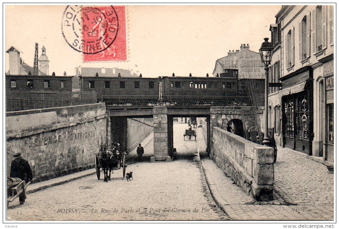 78 POISSY - La Rue De Paris Et Le Pont Du Chemin De Fer - Poissy