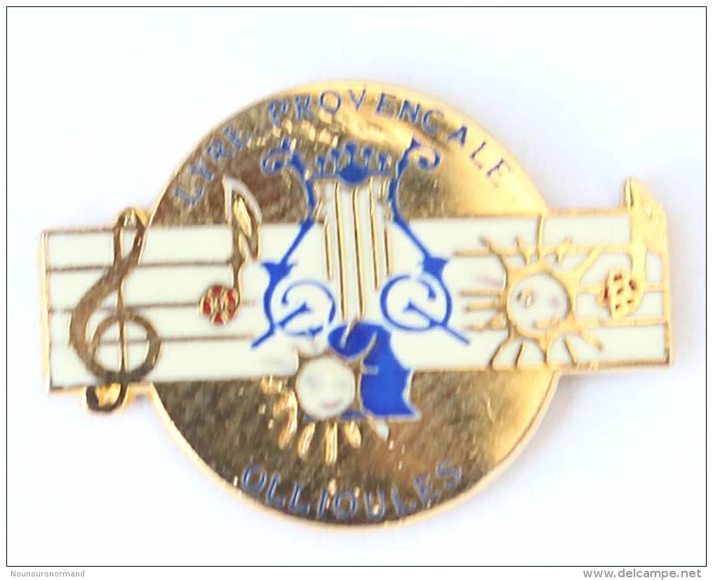 Pin's OLLIOULES (83) - LA LYRE PROVENCALE - Lyre - Partition - Notes De Musique - Soleil - H088 - Ciudades