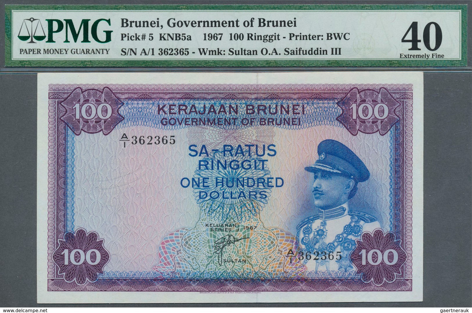 01173 Brunei: 100 Ringgit 1967 P. 5, Condition: PMG Graded 40 XF. - Brunei