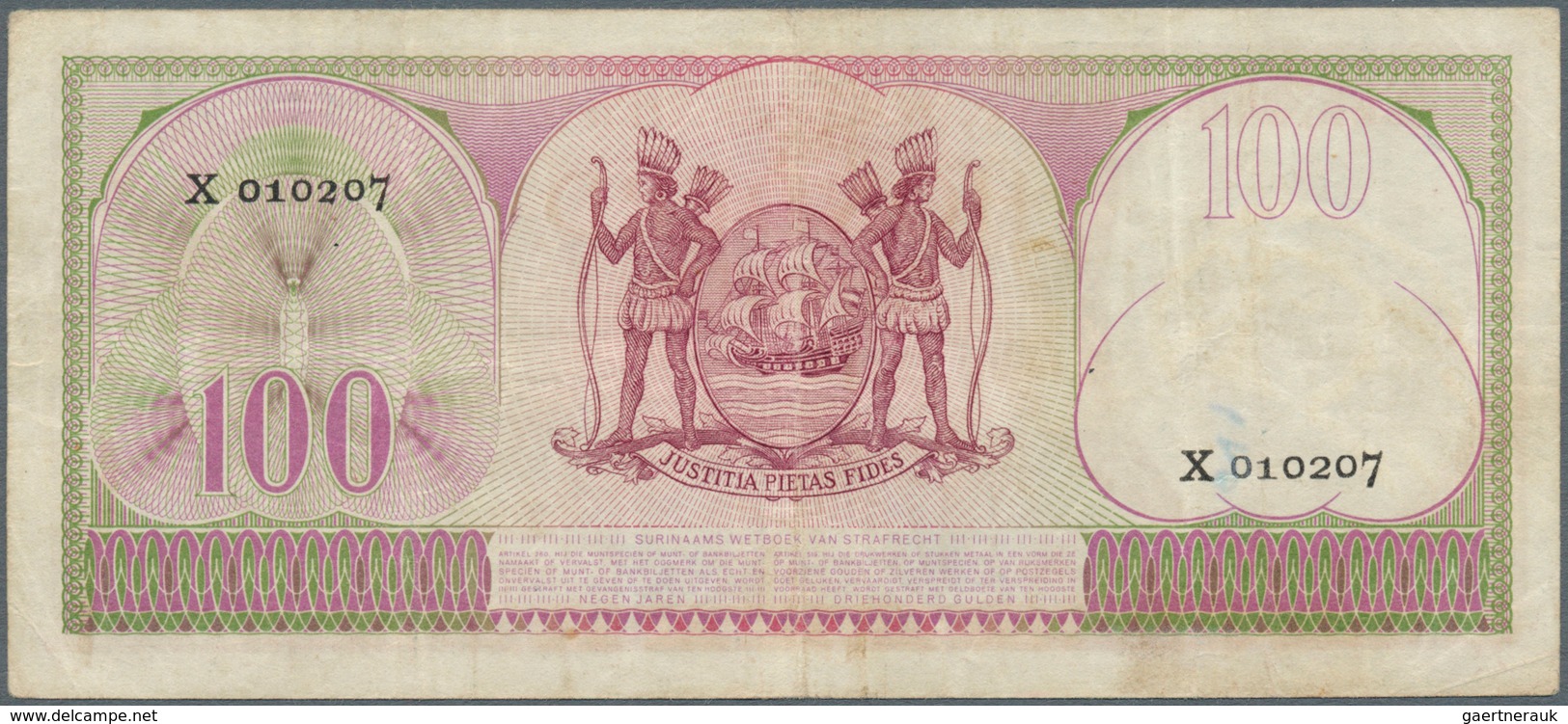 02453 Suriname: 100 Gulden 1957 P. 114, Used With Folds And Stain In Paper, Pressed, Condition: F. - Suriname