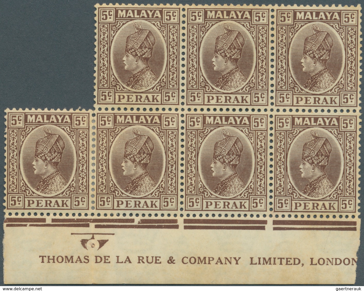 06663 Malaiische Staaten - Perak: 1935, 5c. Brown, Bottom Marginal Block Of Seven (folded) With (almost) F - Perak