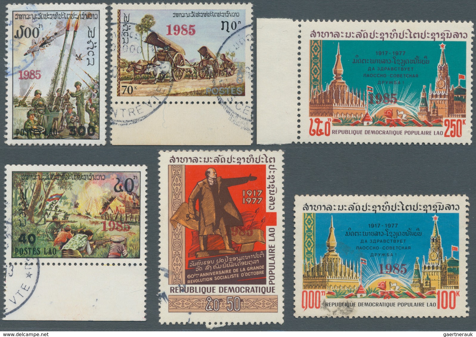 09337 Laos: 1985. Set Of 12 Stamps Of Former Issues Each Red Overprinted By "1985". Sc #676 H, I, J Mint, - Laos