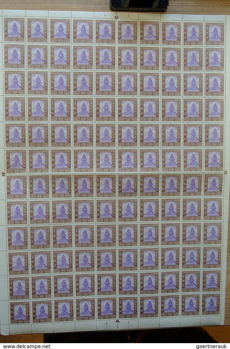 23700 Nepal: Box with ca. 65, mostly complete, MNH sheets of Nepal, including some nice thematic material.