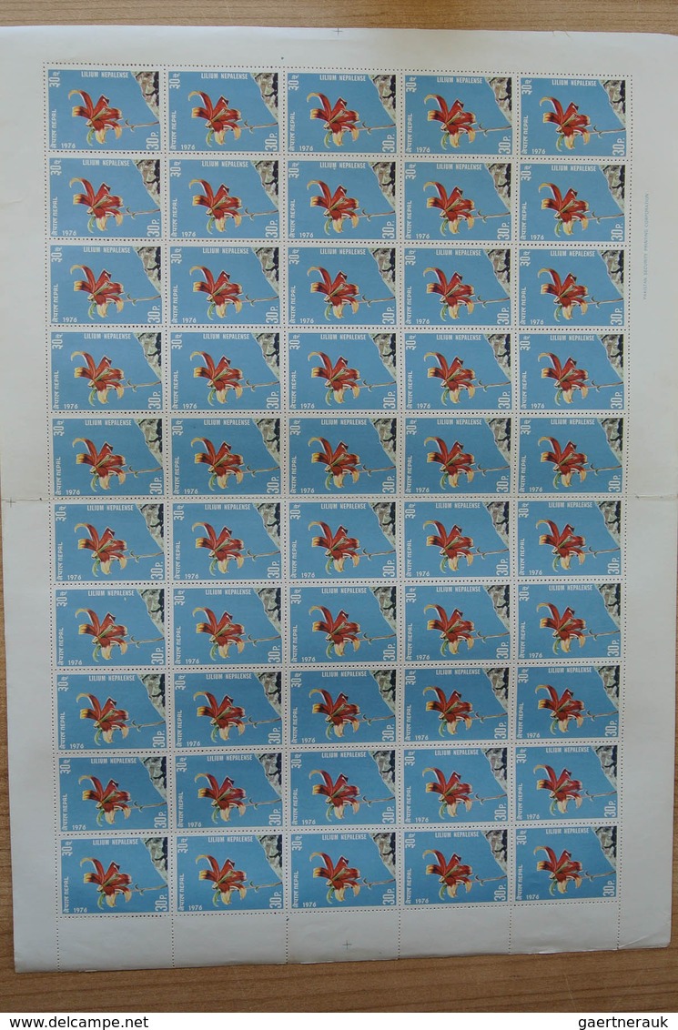 23700 Nepal: Box with ca. 65, mostly complete, MNH sheets of Nepal, including some nice thematic material.