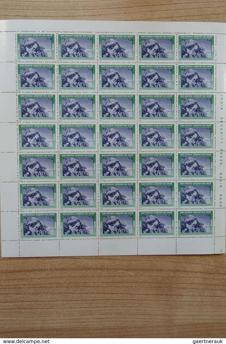 23700 Nepal: Box with ca. 65, mostly complete, MNH sheets of Nepal, including some nice thematic material.