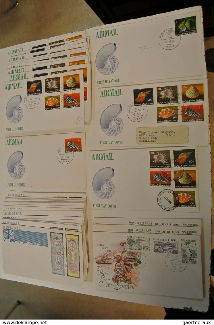 23812 Papua Neuguinea: 1952/88: Lot of ca. 1400 FDC's of Papua New Guinea 1952-1988 in large box. Lot cont