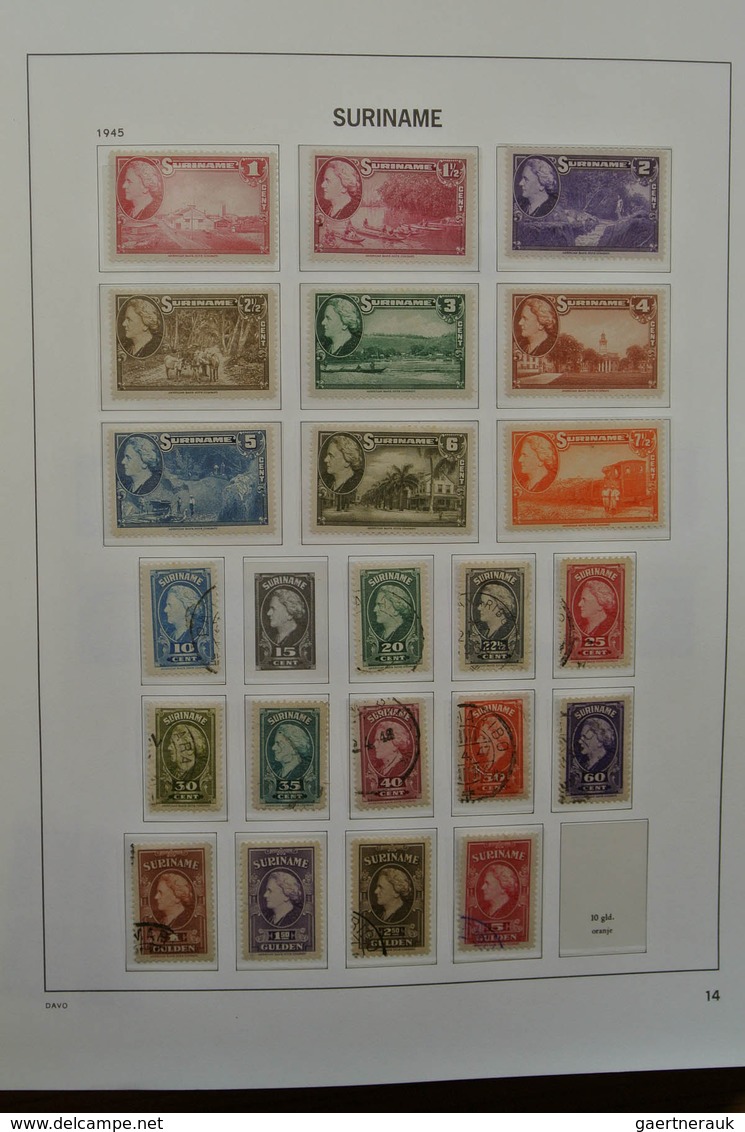 24151 Surinam: 1873-1975. Nicely filled, MNH, mint hinged and used collection Surinam in Davo luxe album.