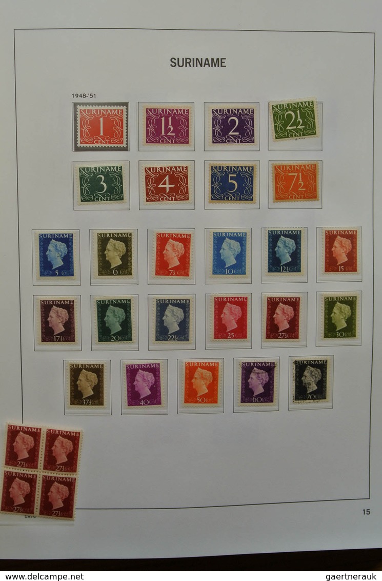 24151 Surinam: 1873-1975. Nicely filled, MNH, mint hinged and used collection Surinam in Davo luxe album.