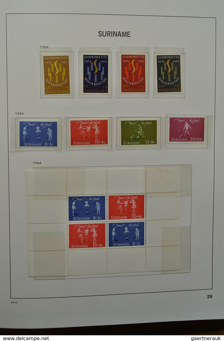 24151 Surinam: 1873-1975. Nicely filled, MNH, mint hinged and used collection Surinam in Davo luxe album.