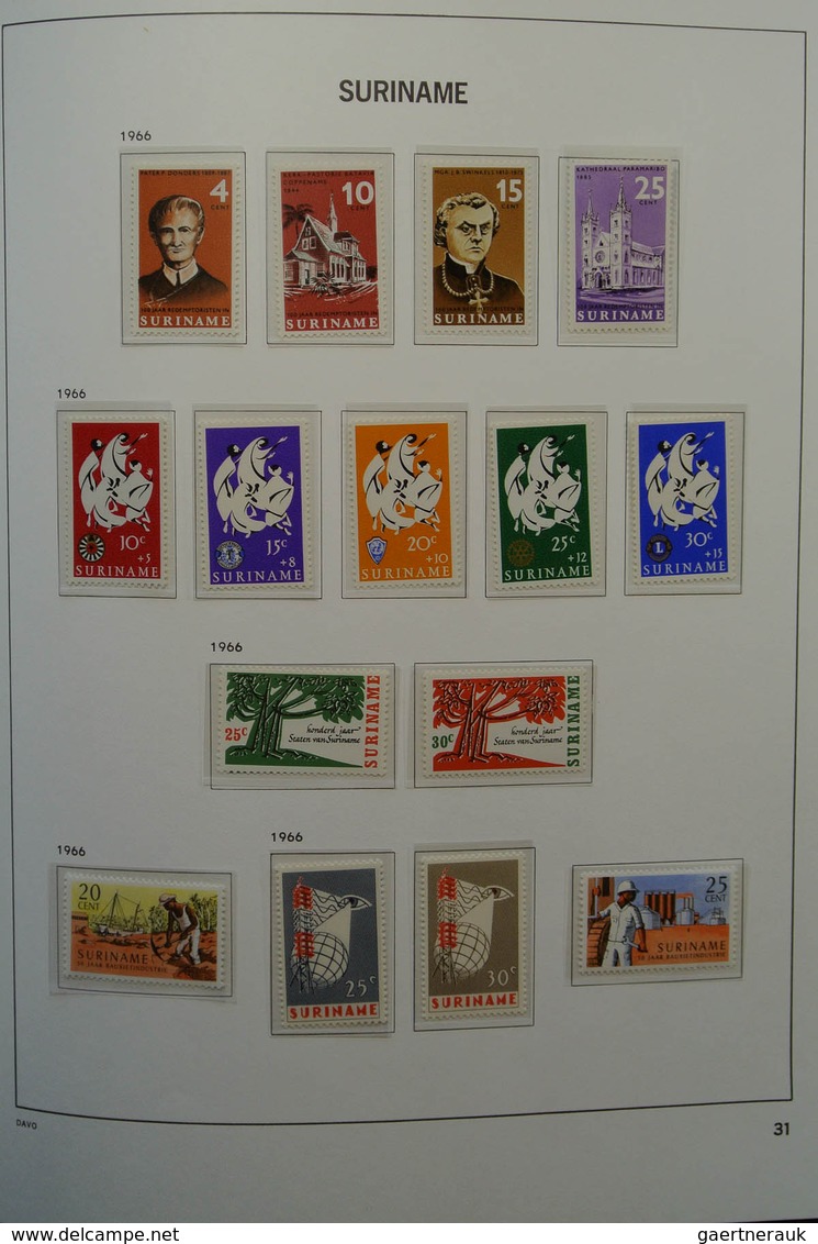 24151 Surinam: 1873-1975. Nicely filled, MNH, mint hinged and used collection Surinam in Davo luxe album.