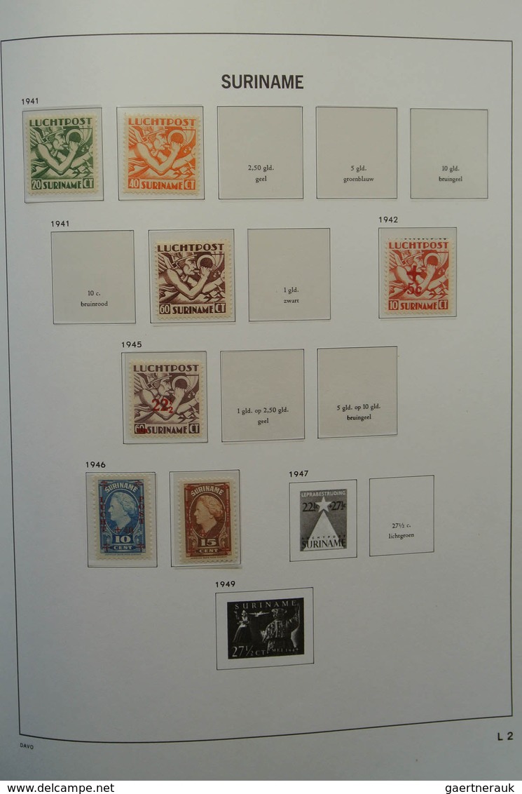 24151 Surinam: 1873-1975. Nicely filled, MNH, mint hinged and used collection Surinam in Davo luxe album.